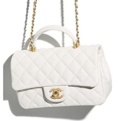 chanel medium white flap bag|Chanel mini flap bag with top handle.